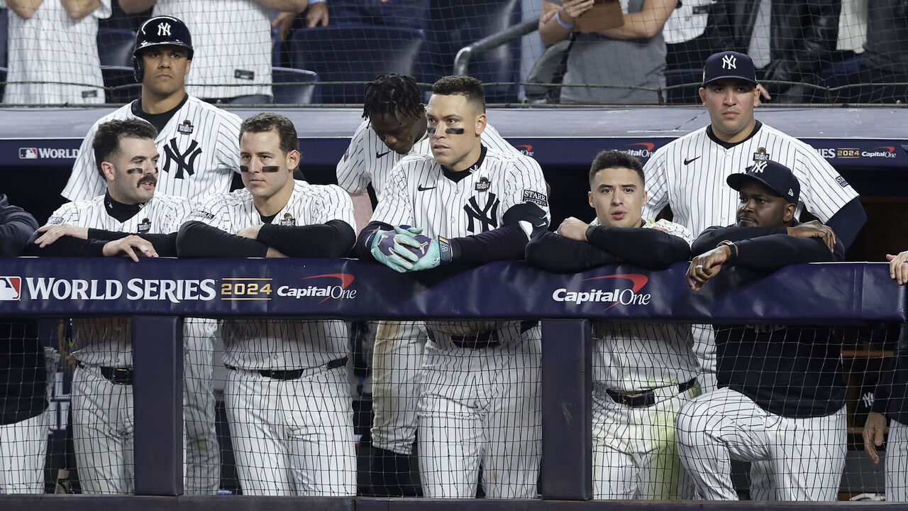 NEW YORK, NEW YORK - OCTOBER 30: (NEW YORK DAILIES OUT) The New York Yankees look on from the dugout during the ninth inning against the Los Angeles Dodgers during Game Five of the 2024 World Series at Yankee Stadium on October 30, 2024 in New York City. The Dodgers defeated the Yankees 7-6.