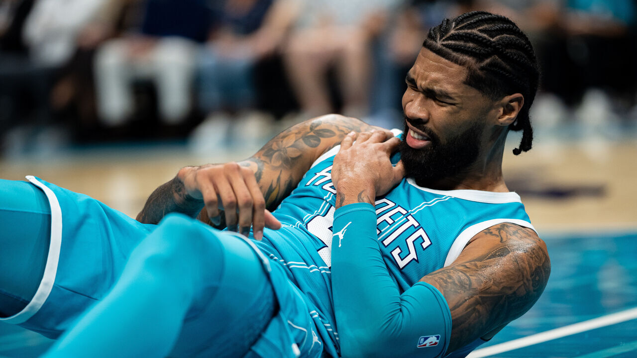 CHARLOTTE, NORTH CAROLINA - NOVEMBER 01: Nick Richards #4 of the Charlotte Hornets is shaken up after a play during their game against the Boston Celtics at Spectrum Center on November 01, 2024 in Charlotte, North Carolina.