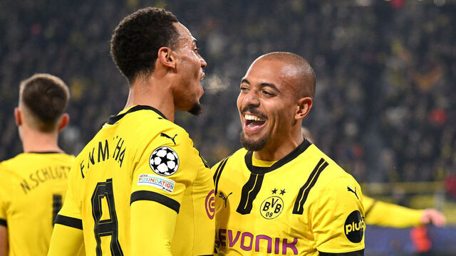 DORTMUND, GERMANY - NOVEMBER 05: Donyell Malen of Borussia Dortmund celebrates with teammate Felix Nmecha after scoring his team's first goal during the UEFA Champions League 2024/25 League Phase MD4 match between Borussia Dortmund and SK Sturm Graz at BVB Stadion Dortmund on November 05, 2024 in Dortmund, Germany.