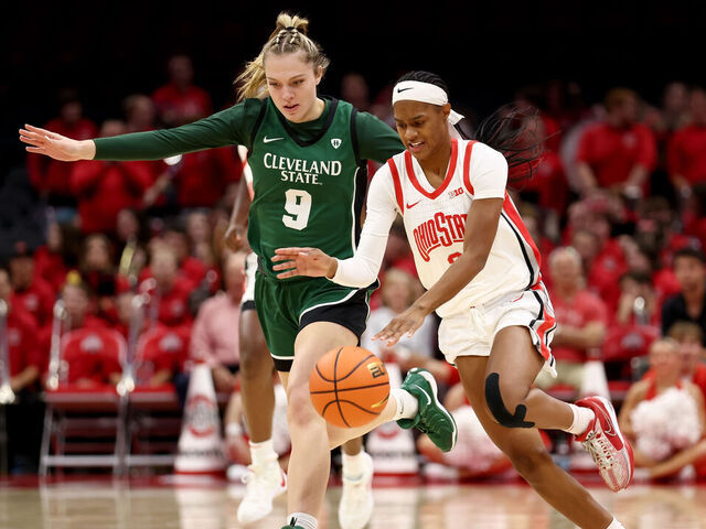 COLUMBUS, OHIO - NOVEMBER 5: Kennedy Cambridge #3 of the Ohio State Buckeyes pushes the ball up the court against the defense of Sarah Hurley #9 of the Cleveland State Vikings during the fourth quarter of the game at Value City Arena on November 5, 2024 in Columbus, Ohio. Ohio State defeated Cleveland State 104-69.