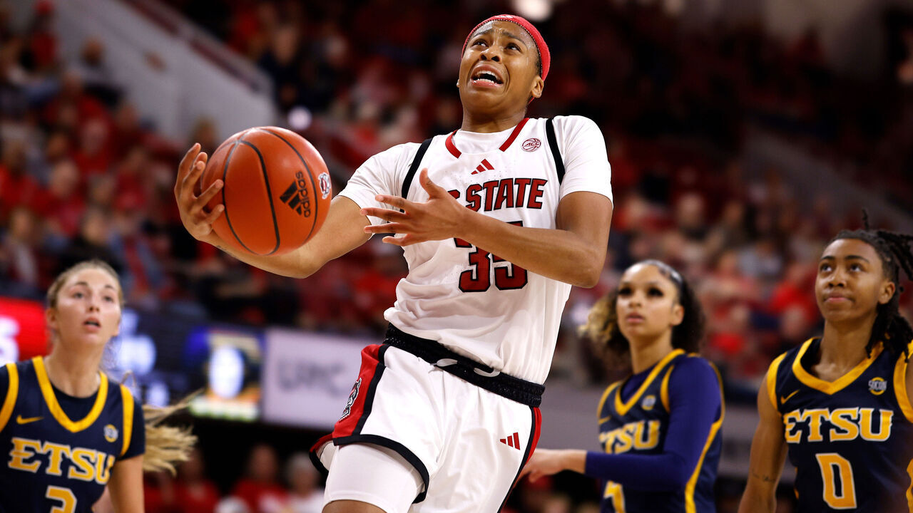 RALEIGH, NORTH CAROLINA - NOVEMBER 5: Zoe Brooks #35 of the NC State Wolfpack goes to the basket against the East Tennessee State Lady Buccaneers during the first half of the game at Reynolds Coliseum on November 5, 2024 in Raleigh, North Carolina.