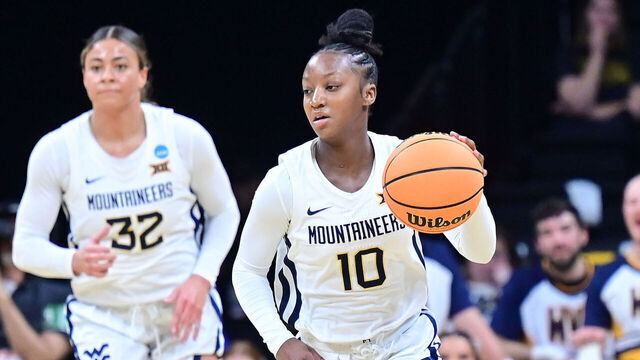IOWA CITY, IA - MARCH 23: dWest Virginia guard Jordan Harrison (10) brings the ball up the court during the Princeton Tigers game versus the West Virginia Mountaineers in the first round of the NCAA Division I Women's Championship on March 23, 2024, at Carver-Hawkeye Arena in Iowa City, IA.