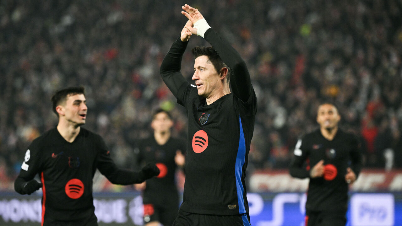 Barcelona's Polish forward #09 Robert Lewandowski (C) celebrates after scoring a goal during the UEFA Champions League, League phase - Matchday 4 football match between Crvena Zvezda Beograd and FC Barcelona, at the Rajko-Mitic Stadium, in Belgrade, on November 6, 2024.