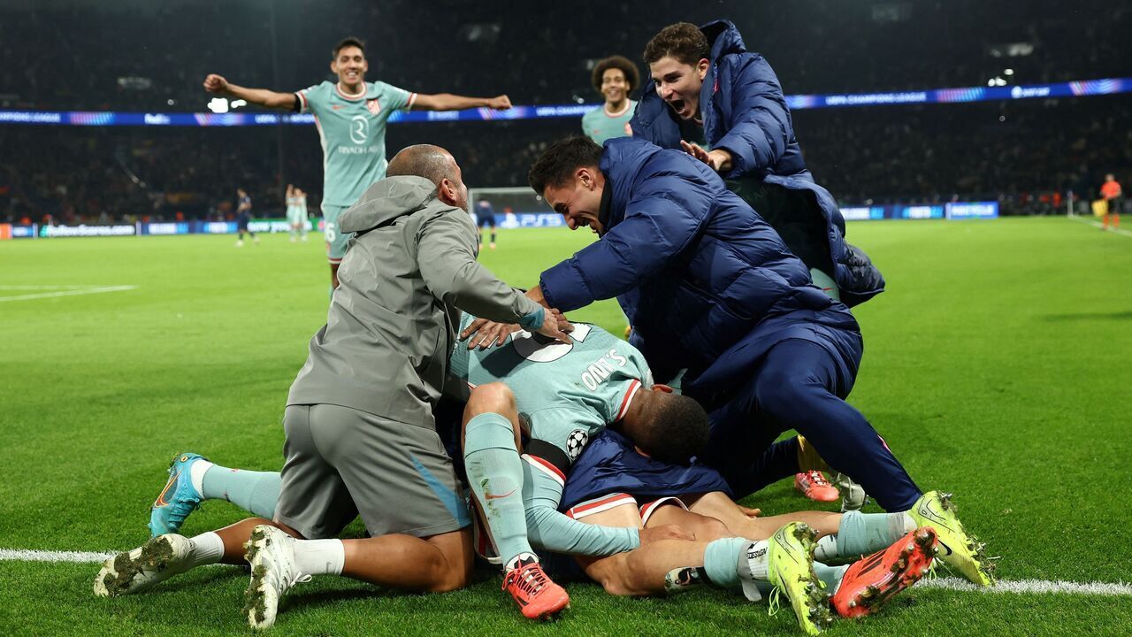 Atletico's team celebrates after scoring and winning the UEFA Champions League, League phase - Matchday 4, football match between Paris Saint-Germain (PSG) and Atletico Madrid, at the Parc des Princes stadium in Paris on November 6, 2024.