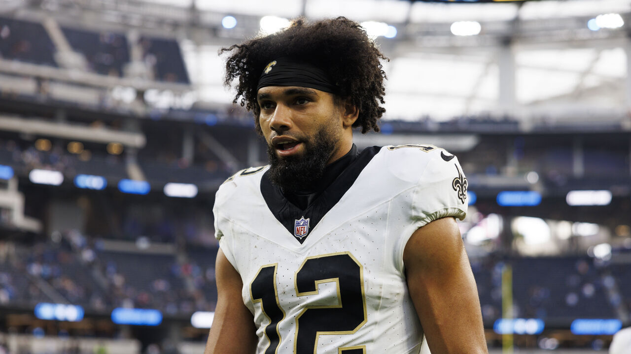 INGLEWOOD, CALIFORNIA - OCTOBER 27: Chris Olave #12 of the New Orleans Saints walks off the field after the game against the Los Angeles Chargers at SoFi Stadium on October 27, 2024 in Inglewood, California.