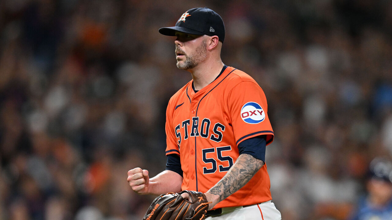 HOUSTON, TEXAS - AUGUST 2: Ryan Pressly #55 of the Houston Astros reacts after inducing an inning ending ground out against the Tampa Bay Rays during the eighth inning at Minute Maid Park on August 2, 2024 in Houston, Texas.