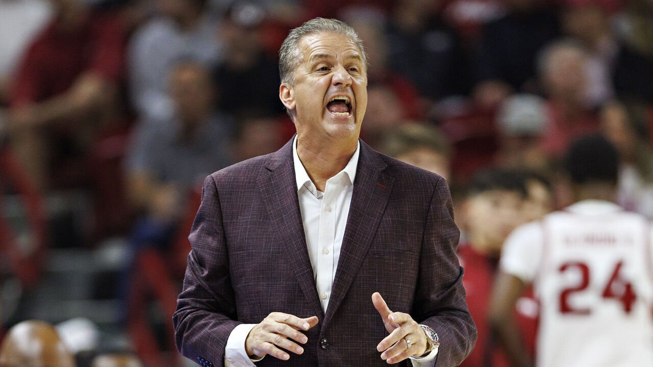 FAYETTEVILLE, ARKANSAS - NOVEMBER 06: Head Coach John Calipari of the Arkansas Razorbacks yells to his team during the first half of a game against the Lipscomb Bisons at Bud Walton Arena on November 06, 2024 in Fayetteville, Arkansas.
