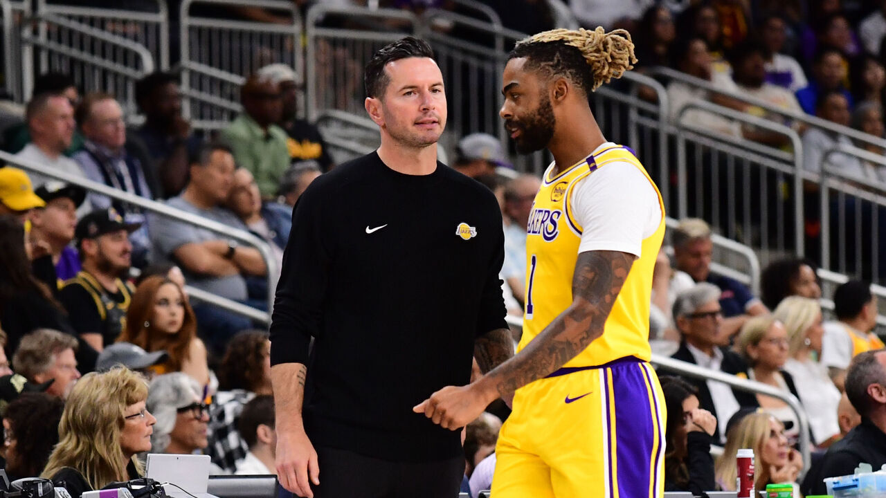 PALM SPRINGS, CA - OCTOBER 4: Head Coach JJ Redick and D'Angelo Russell #1 of the Los Angeles Lakers looks on during the game against the Minnesota Timberwolves during an NBA preseason game on October 4, 2024 at Acrisure Arena in Palm Springs, California. NOTE TO USER: User expressly acknowledges and agrees that, by downloading and/or using this Photograph, user is consenting to the terms and conditions of the Getty Images License Agreement. Mandatory Copyright Notice: Copyright 2024 NBAE