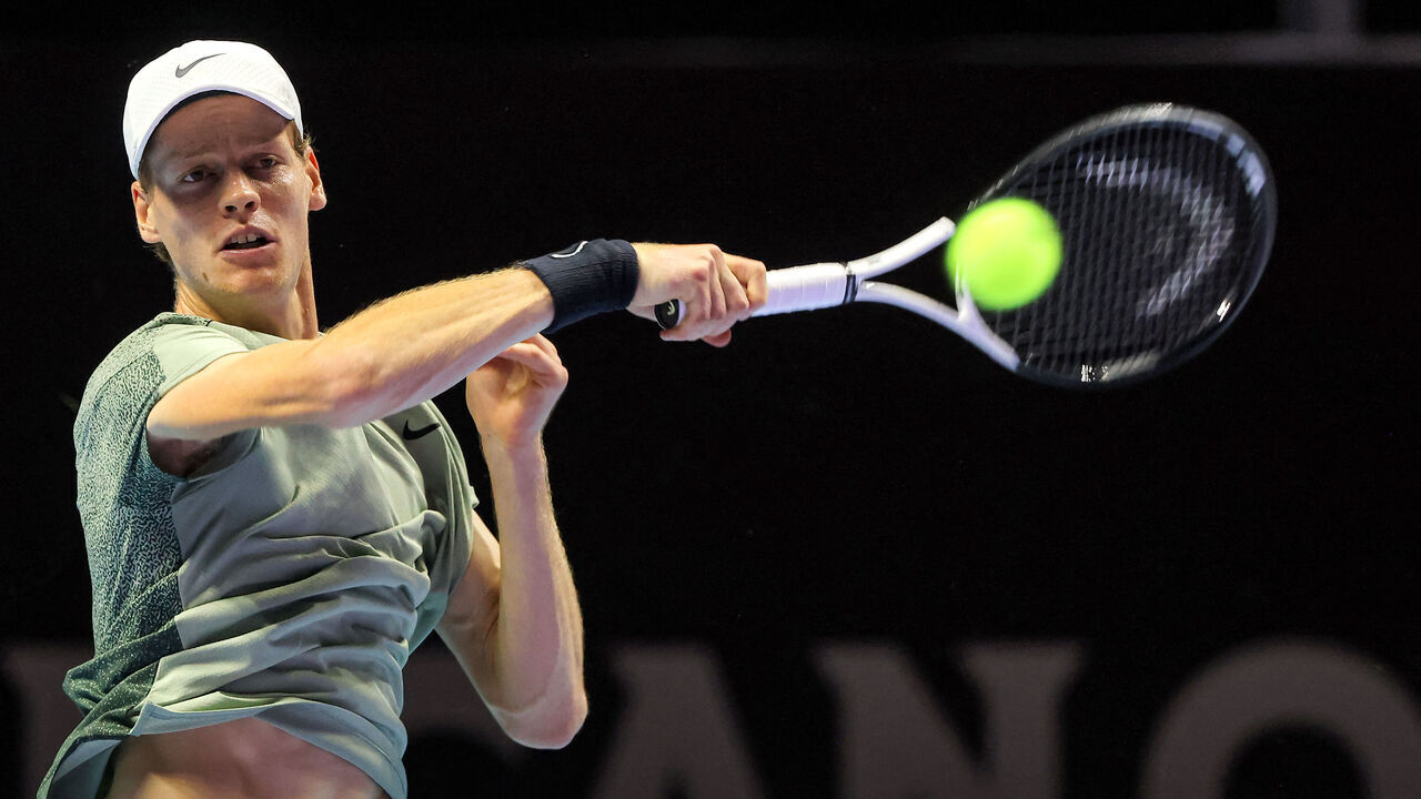 Italy's Jannik Sinner hits a return to Spain's Carlos Alcaraz during their final tennis match in the "6 Kings Slam" exhibition tournament in Riyadh on October 19, 2024.