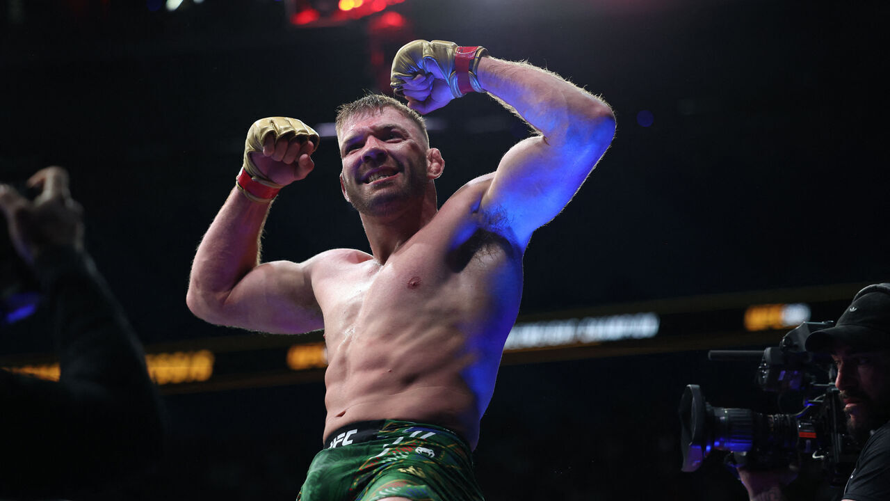 South Africa's Dricuc Du Plessis reacts after winning against New Zealand's Israel Adesanya in their men's middleweight division event of the Ultimate Fighting Championship (UFC) 305 at the Perth Arena in Perth on August 18, 2024.