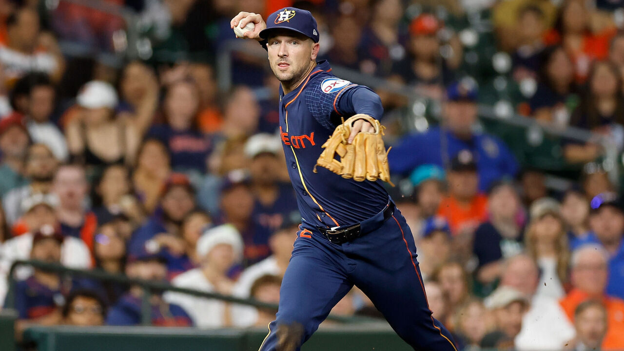 HOUSTON, TEXAS - SEPTEMBER 23: Alex Bregman #2 of the Houston Astros throws to first base in the eighth inning against the Seattle Mariners at Minute Maid Park on September 23, 2024 in Houston, Texas.