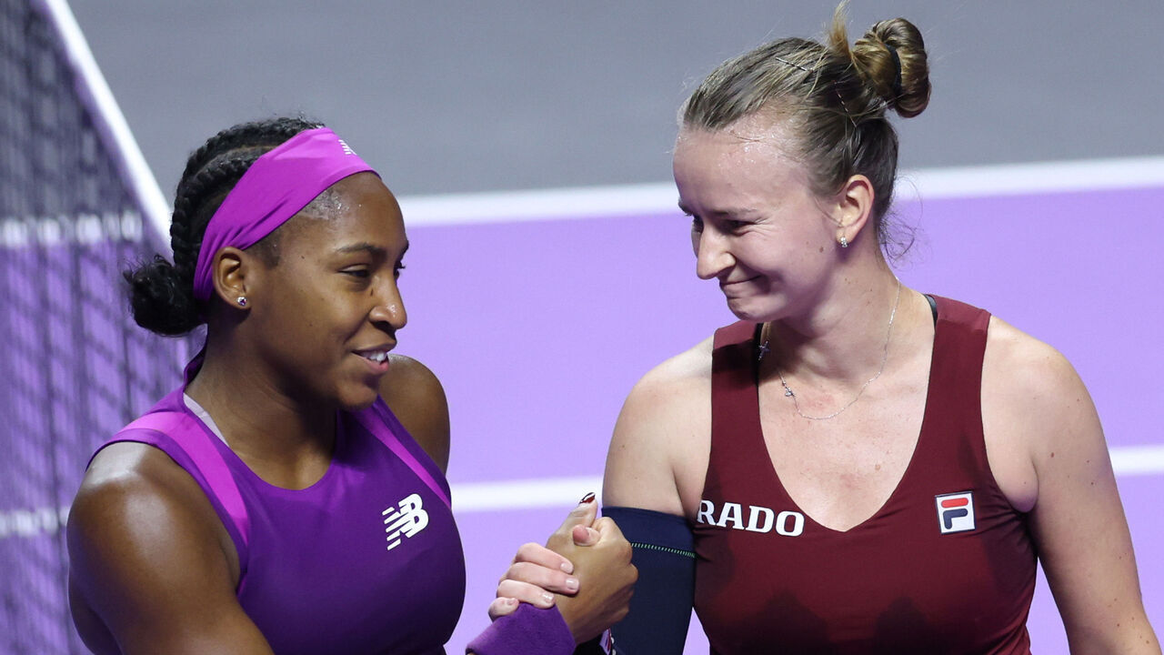 RIYADH, SAUDI ARABIA - NOVEMBER 07: Barbora Krejcikova of Czechia shakes hands at the net after her straight sets victory against Coco Gauff of the United States in their round robin singles match during Day 6 of the 2024 WTA Finals Riyadh as part of the Hologic WTA Tour at King Saud University Indoor Arena on November 07, 2024 in Riyadh, Saudi Arabia.