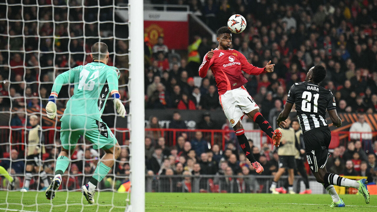 Manchester United's Ivorian midfielder #16 Amad Diallo scores the opening goal during the UEFA Europa league, League Phase football match between Manchester United and PAOK Thessaloniki at Old Trafford stadium in Manchester, north west England, on November 7, 2024.