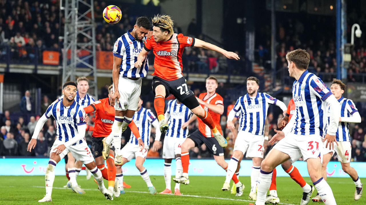 Luton Town's Daiki Hashioka attempts a headed shot towards goal during the Sky Bet Championship match at Kenilworth Road, Luton. Picture date: Friday November 1, 2024.