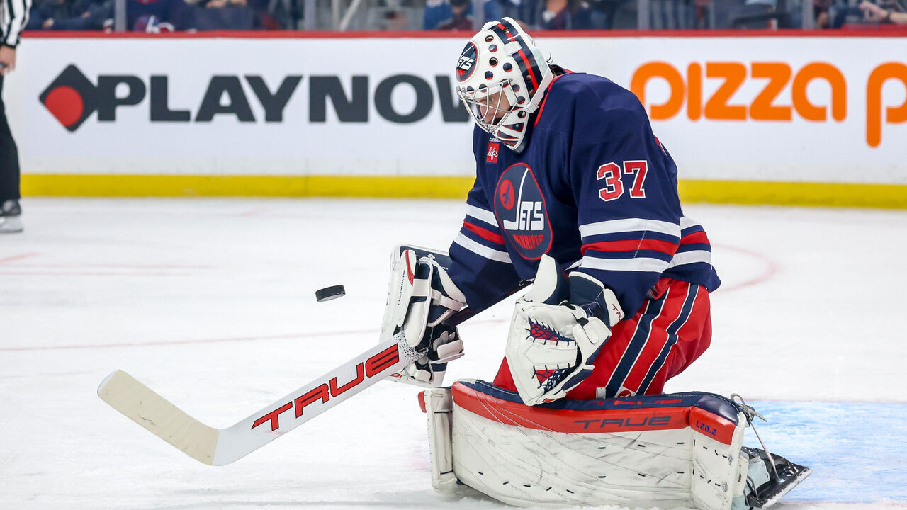 WINNIPEG, CANADA - NOVEMBER 7: Goaltender Connor Hellebuyck #37 of the Winnipeg Jets makes a save during first period action against the Colorado Avalanche at the Canada Life Centre on November 7, 2024 in Winnipeg, Manitoba, Canada.