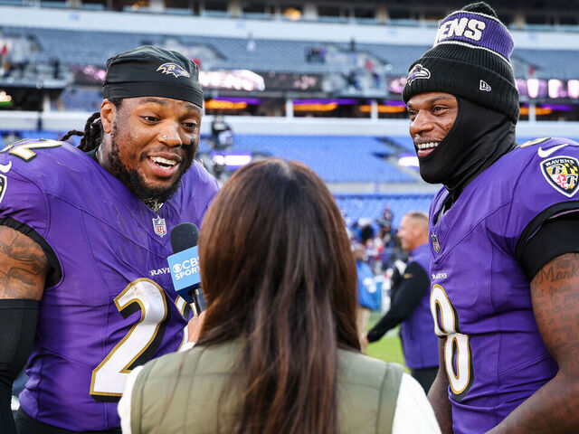 BALTIMORE, MD - NOVEMBER 03: Derrick Henry #22 and Lamar Jackson #8 of the Baltimore Ravens are interviewed on the field after the game against the Denver Broncos at M&T Bank Stadium on November 3, 2024 in Baltimore, Maryland.