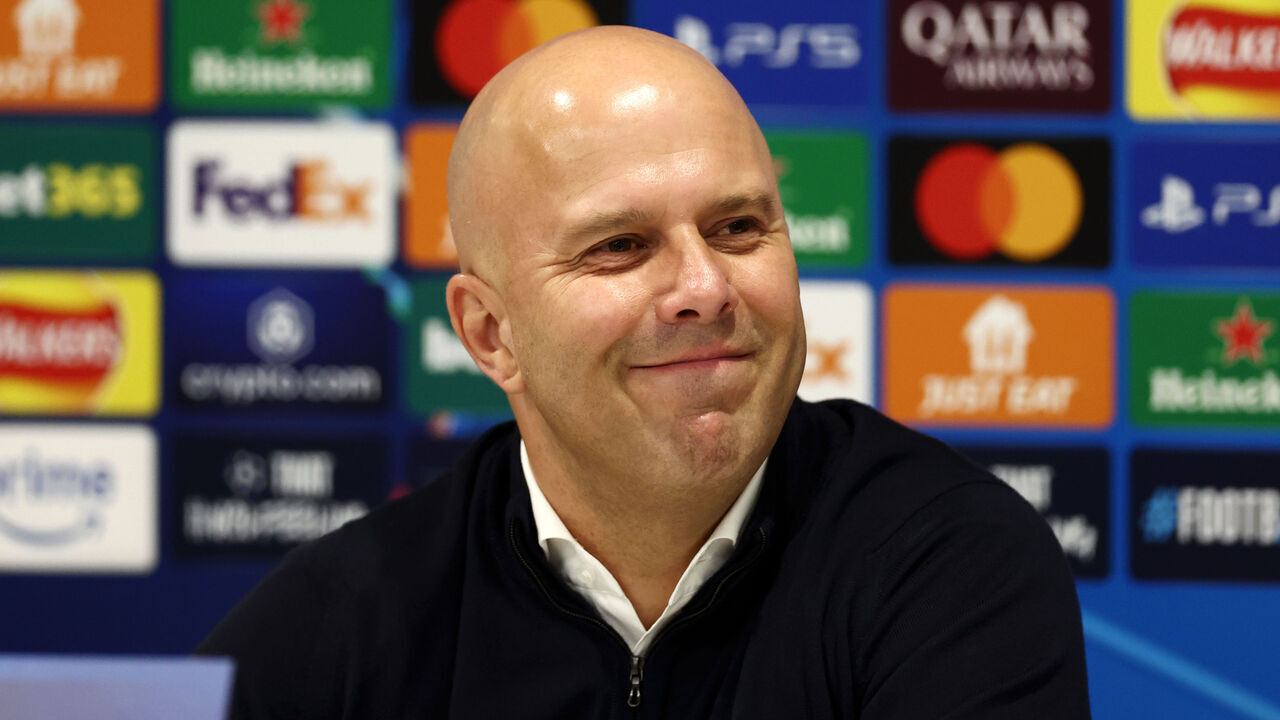 LIVERPOOL, ENGLAND - NOVEMBER 05: Arne Slot, Manager of Liverpool speaks to the media in the post match press conference during the UEFA Champions League 2024/25 League Phase MD4 match between Liverpool FC and Bayer 04 Leverkusen at Anfield on November 05, 2024 in Liverpool, England.