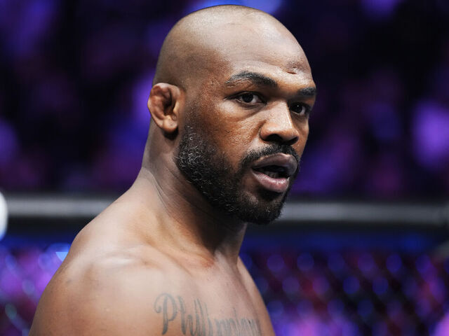 LAS VEGAS, NEVADA - MARCH 04: Jon Jones enters the Octagon in the UFC heavyweight championship fight during the UFC 285 event at T-Mobile Arena on March 04, 2023 in Las Vegas, Nevada.