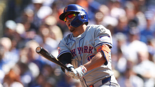 LOS ANGELES, CALIFORNIA - OCTOBER 14: Tyrone Taylor #15 of the New York Mets hits for an RBI double against the Los Angeles Dodgers in the second inning during Game Two of the Championship Series at Dodger Stadium on October 14, 2024 in Los Angeles, California.