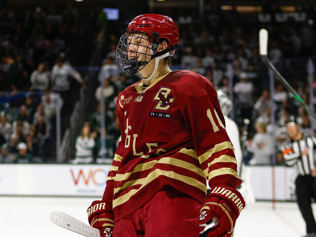 EAST LANSING, MI - OCTOBER 11: James Hagens #10 of Boston College is all smiles after his assist during a game between Boston College and Michigan State University at Munn Ice Arena on October 11, 2024 in East Lansing, Michigan.