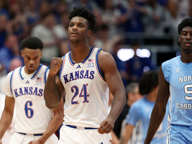 LAWRENCE, KANSAS - NOVEMBER 08: KJ Adams Jr. #24 of the Kansas Jayhawks reacts after drawing a foul during the first half of the game against the North Carolina Tar Heels at Allen Fieldhouse on November 08, 2024 in Lawrence, Kansas.