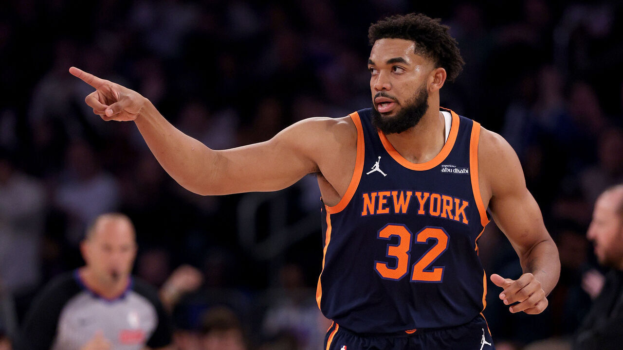 NEW YORK, NEW YORK - NOVEMBER 08: Karl-Anthony Towns #32 of the New York Knicks celebrates his three point shot in the first half against the Milwaukee Bucks at Madison Square Garden on November 08, 2024 in New York City.