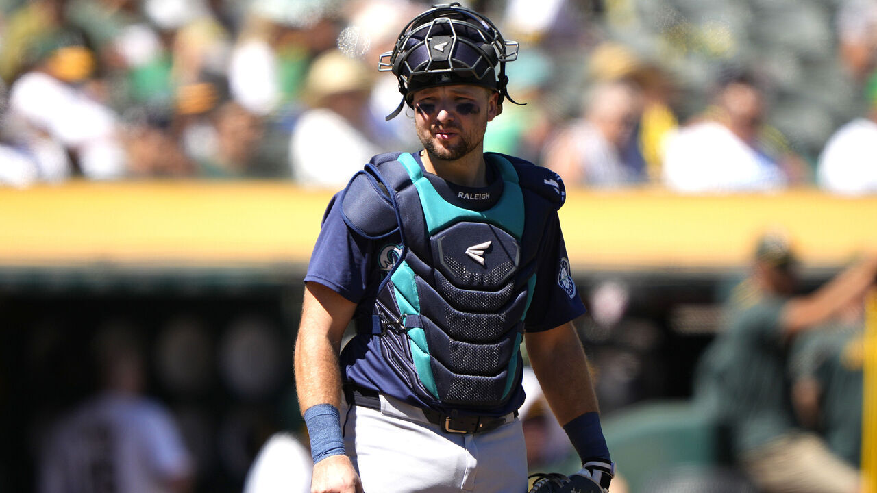 OAKLAND, CALIFORNIA - SEPTEMBER 05: Cal Raleigh #29 of the Seattle Mariners looks on against the Oakland Athletics in the bottom of the third inning at the Oakland Coliseum on September 5, 2024 in Oakland, California.