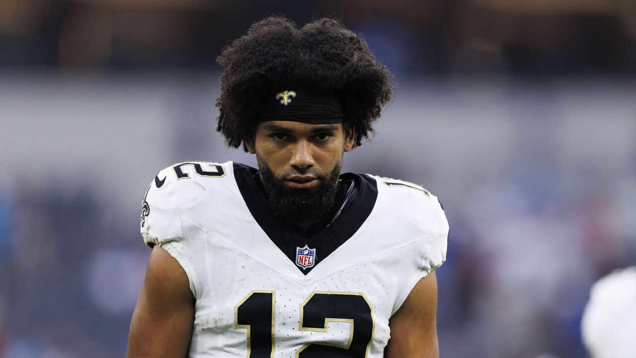 INGLEWOOD, CALIFORNIA - OCTOBER 27: Chris Olave #12 of the New Orleans Saints walks off the field after the game against the Los Angeles Chargers at SoFi Stadium on October 27, 2024 in Inglewood, California.