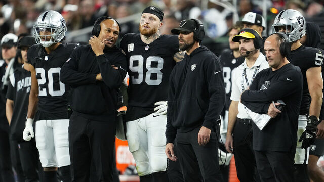 LAS VEGAS, NEVADA - NOVEMBER 26: Maxx Crosby #98 and Interim head coach Antonio Pierce of the Las Vegas Raiders talk on the sideline during the fourth quarter of a game against the Kansas City Chiefs at Allegiant Stadium on November 26, 2023 in Las Vegas, Nevada.