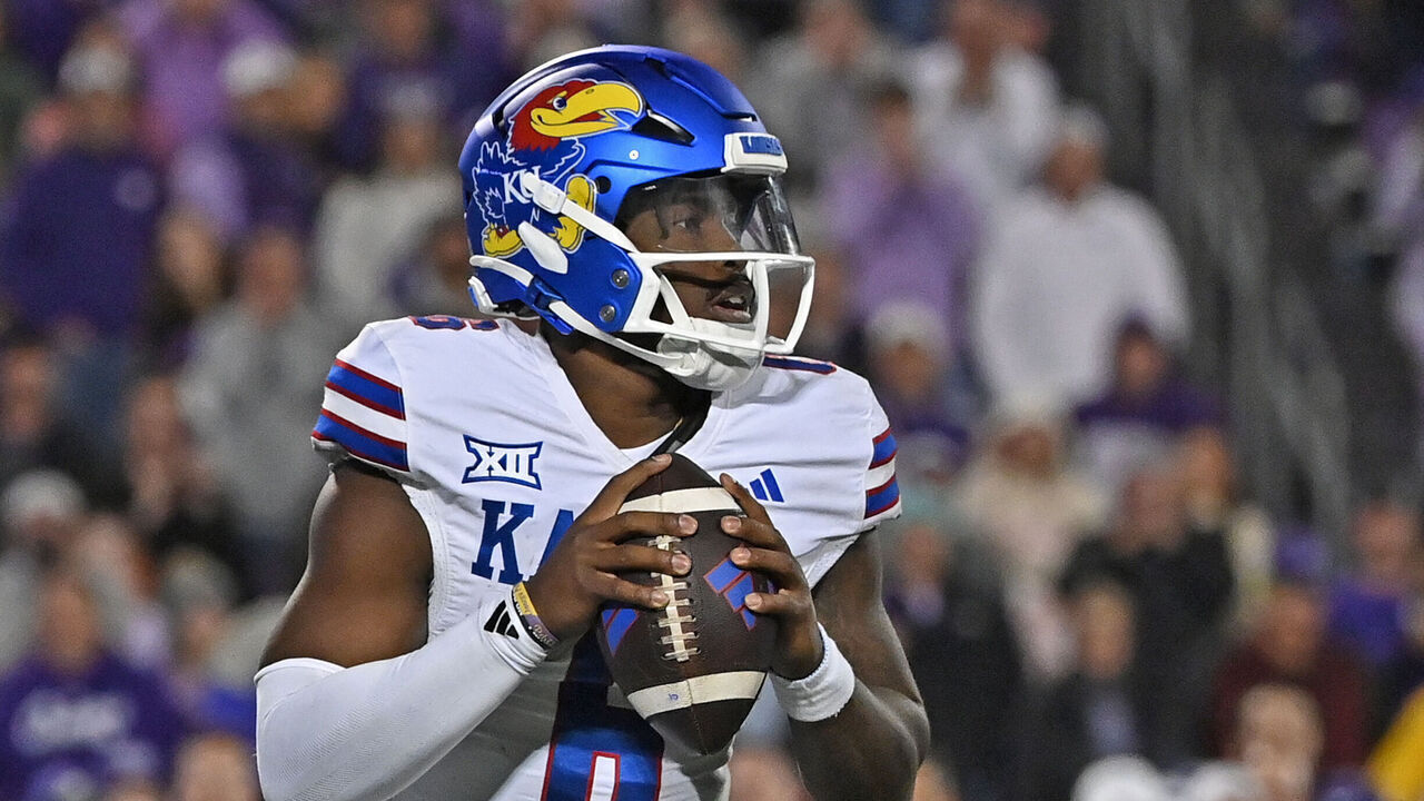 MANHATTAN, KS - OCTOBER 26: Quarterback Jalon Daniels #6 of the Kansas Jayhawks looks down field in the second half against the Kansas State Wildcats at Bill Snyder Family Football Stadium on October 26, 2024 in Manhattan, Kansas.