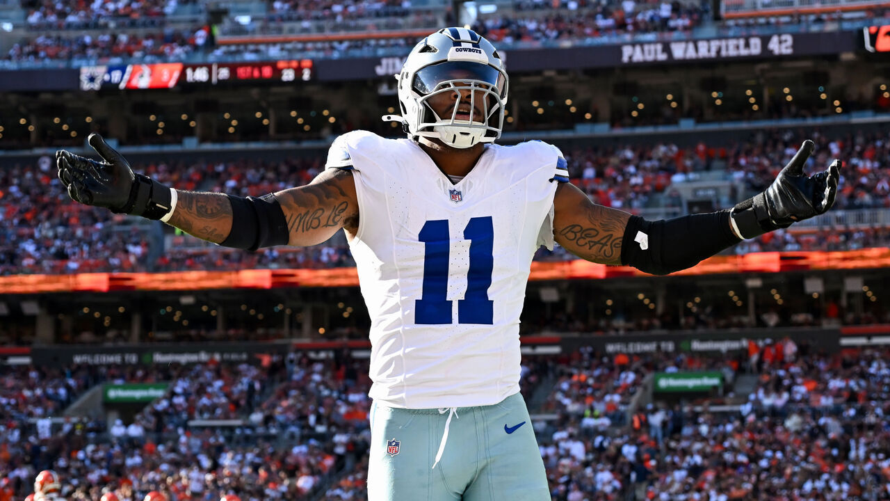 CLEVELAND, OHIO - SEPTEMBER 08: Micah Parsons #11 of the Dallas Cowboys celebrates an interception by Eric Kendricks during the second quarter against the Cleveland Browns at Huntington Bank Field on September 08, 2024 in Cleveland, Ohio.
