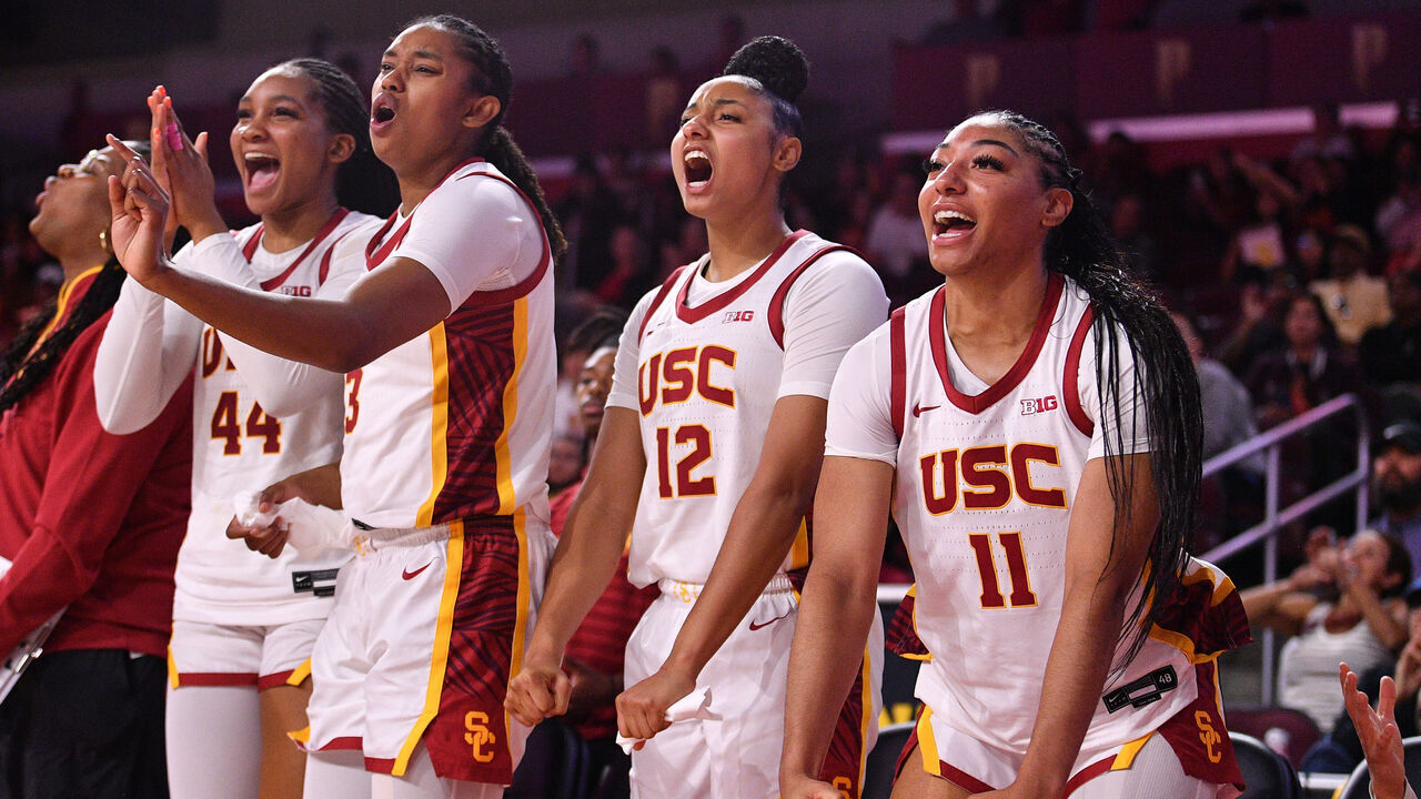 LOS ANGELES, CA - NOVEMBER 09: USC Trojans forward Kiki Iriafen (44), USC Trojans forward Rayah Marshall (13), USC Trojans guard JuJu Watkins (12) and USC Trojans guard Kennedy Smith (11) celebrate on the bench during the women's college basketball game between the Cal Poly Mustangs and the USC Trojans on November 9, 2024 at Galen Center in Los Angeles, CA.