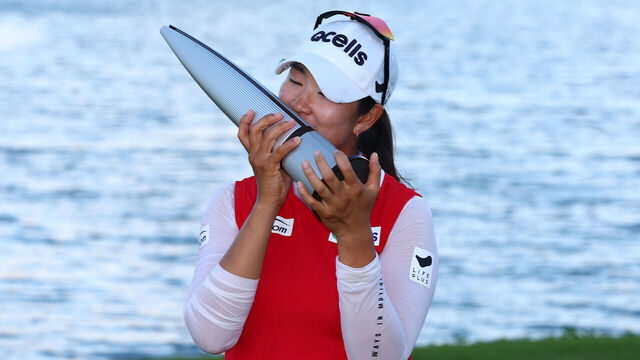 EWA BEACH, HAWAII - NOVEMBER 09: A Lim Kim of South Korea celebrates with the trophy after winning the LOTTE Championship presented by Hoakalei 2024 at Hoakalei Country Club on November 09, 2024 in Ewa Beach, Hawaii.