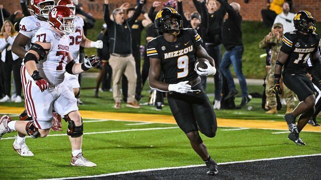COLUMBIA, MO - NOVEMBER 09: Missouri Tigers defensive end Zion Young (9) scoops up the fumble and returns it for a touchdown to give Missouri the lead with thirty seconds left in the fourth quarter during a SEC conference game between the Oklahoma Sooners and the Missouri Tigers held on Saturday Nov 09, 2024 at Faurot Field at Memorial Stadium in Columbia MO. (Photo by Rick Ulreich/Icon Sportswire via Getty Images