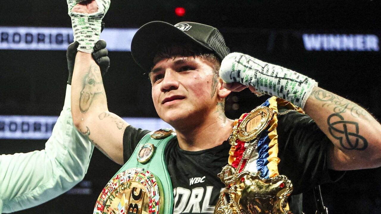 PHOENIX, ARIZONA - JUNE 29: Jesse "Bam" Rodríguez celebrates the victory against Juan Francisco El 'Gallo' Estrada, during their WBC and Ring Magazine super flyweight title fight at Footprint Center on June 29, 2023 in Phoenix, Arizona. Phoenix, Arizona.