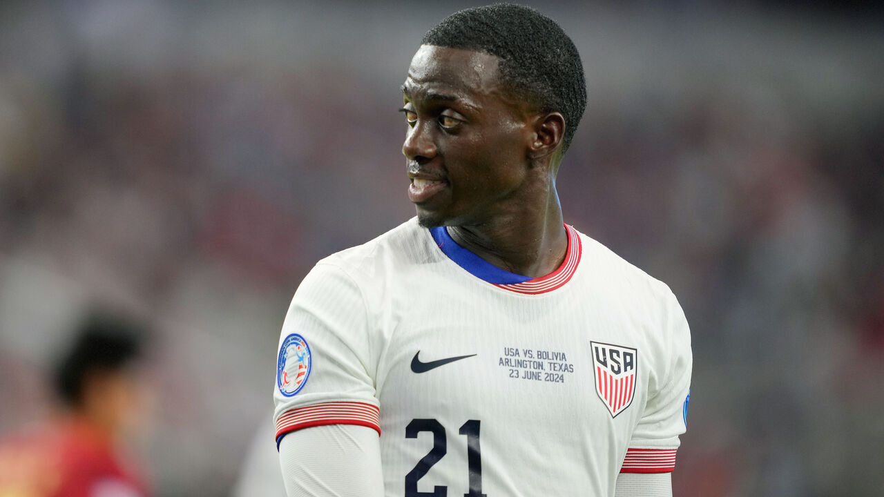 ARLINGTON, TEXAS - JUNE 23: Tim Weah #21 of the United States during the second half against Bolivia at AT&T Stadium on June 23, 2024 in Arlington, Texas.