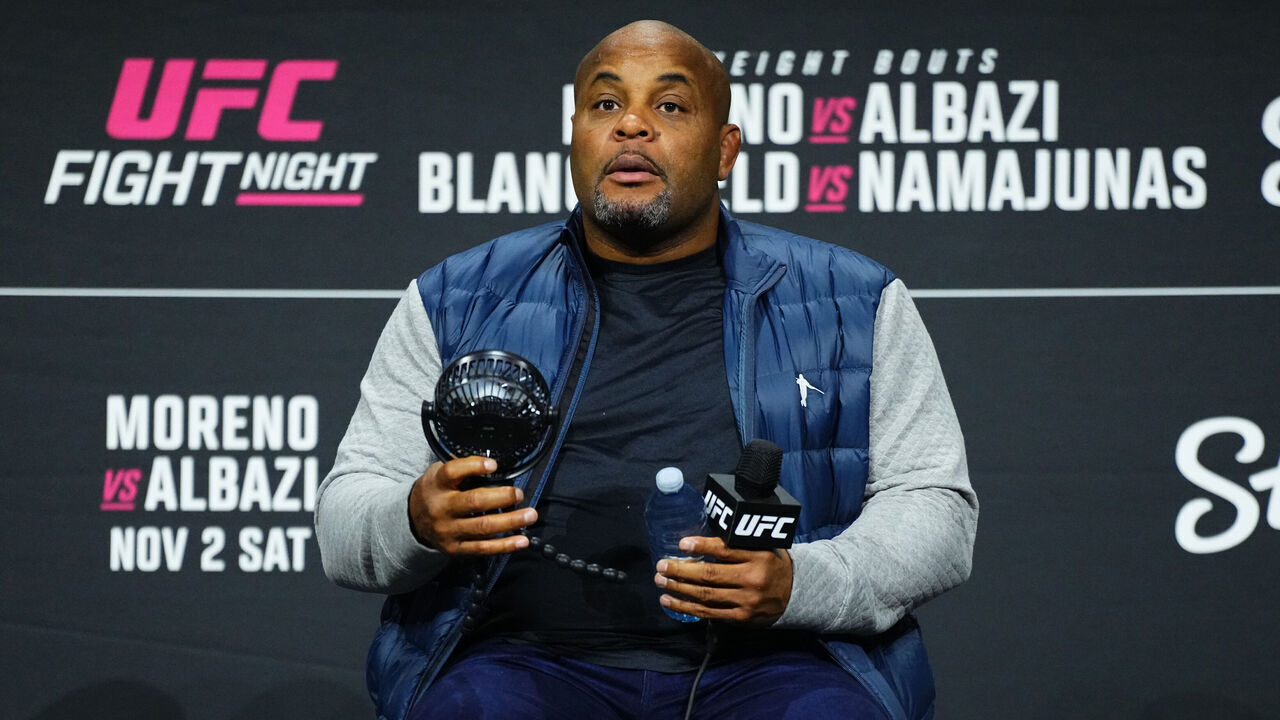 EDMONTON, ALBERTA - NOVEMBER 01: Daniel Cormier is seen on stage during a Q&A session prior to the UFC Fight Night ceremonial weigh-in at Rogers Place on November 01, 2024 in Edmonton, Alberta.