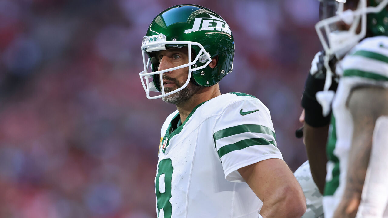 GLENDALE, ARIZONA - NOVEMBER 10: Aaron Rodgers #8 of the New York Jets looks on from the sideline in the second quarter against the Arizona Cardinals at State Farm Stadium on November 10, 2024 in Glendale, Arizona.