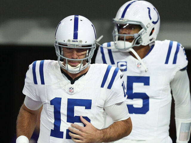 MINNEAPOLIS, MINNESOTA - NOVEMBER 03: Joe Flacco #15 and Anthony Richardson #5 of the Indianapolis Colts run onto the field prior to the game against the Minnesota Vikings at U.S. Bank Stadium on November 03, 2024 in Minneapolis, Minnesota.