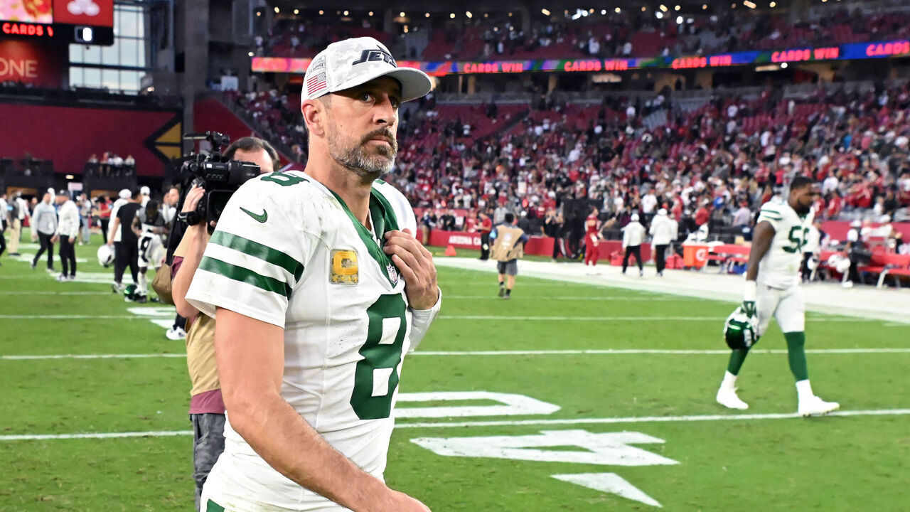 GLENDALE, ARIZONA - NOVEMBER 10: Aaron Rodgers #8 of the New York Jets walks off the field after losing to the Arizona Cardinals 31-6 at State Farm Stadium on November 10, 2024 in Glendale, Arizona.