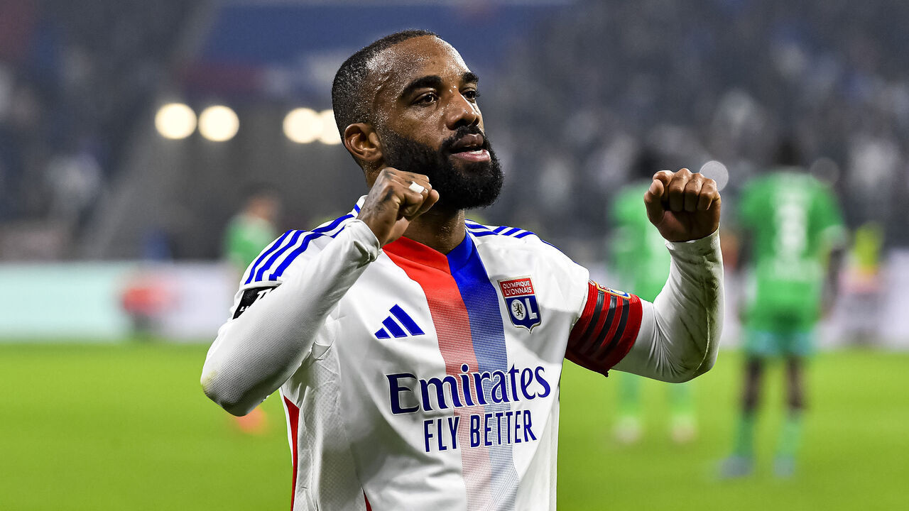 LYON, FRANCE - NOVEMBER 10: Alexandre Lacazette of Lyon celebrates scoring the opening goal during the France Ligue 1 match between Olympique Lyonnais and AS Saint-Étienne at Groupama Stadium on November 10, 2024 in Lyon, France.