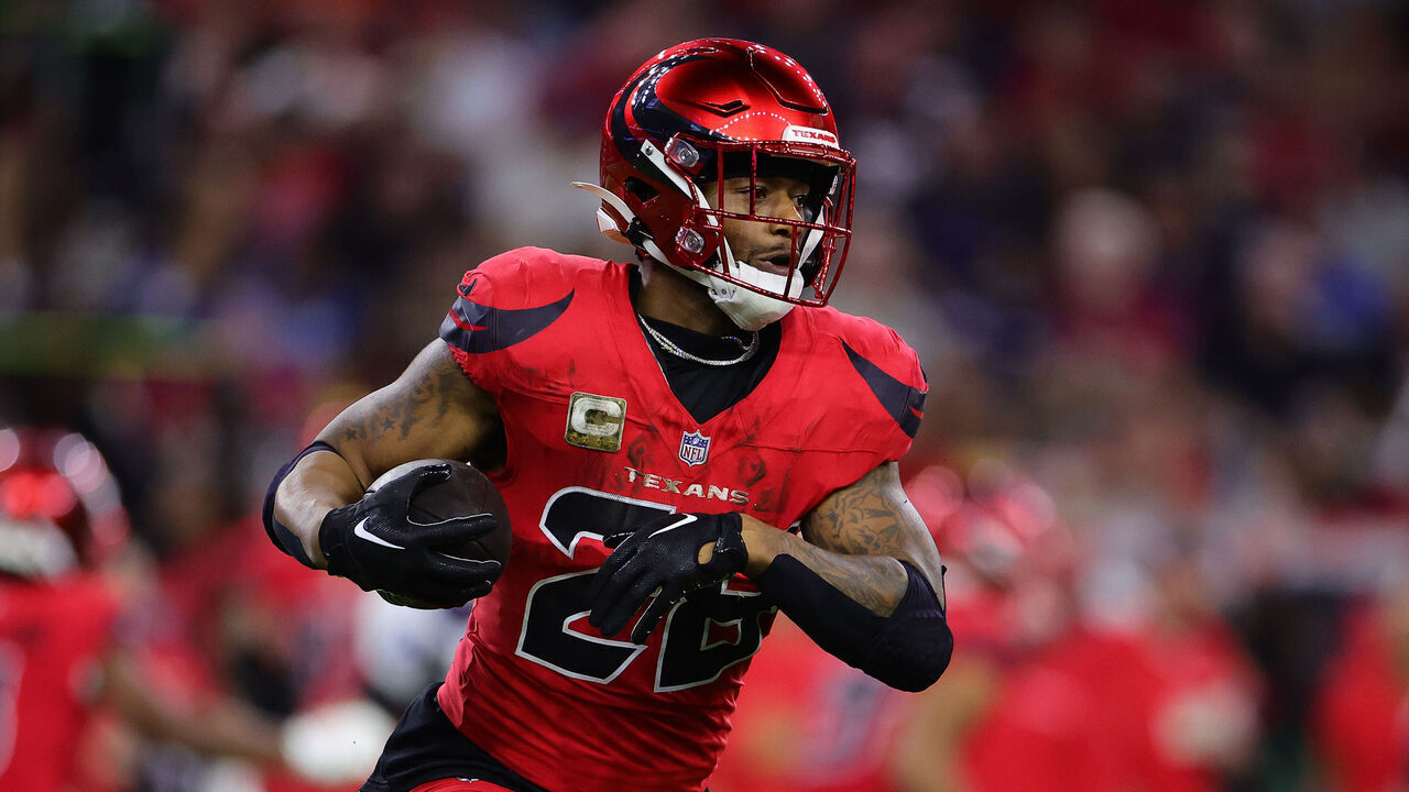 HOUSTON, TEXAS - NOVEMBER 10: Joe Mixon #28 of the Houston Texans runs the ball during the third quarter against the Detroit Lions at NRG Stadium on November 10, 2024 in Houston, Texas.