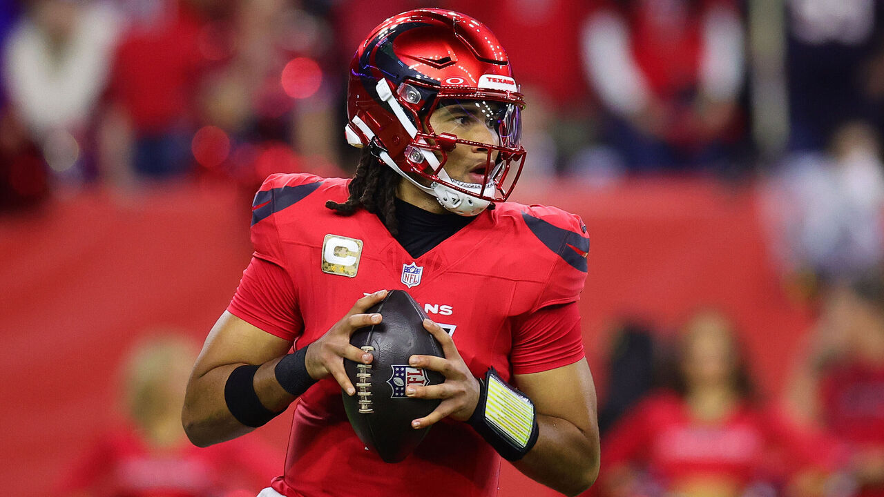 HOUSTON, TEXAS - NOVEMBER 10: C.J. Stroud #7 of the Houston Texans steps back to pass during the third quarter against the Detroit Lions at NRG Stadium on November 10, 2024 in Houston, Texas.