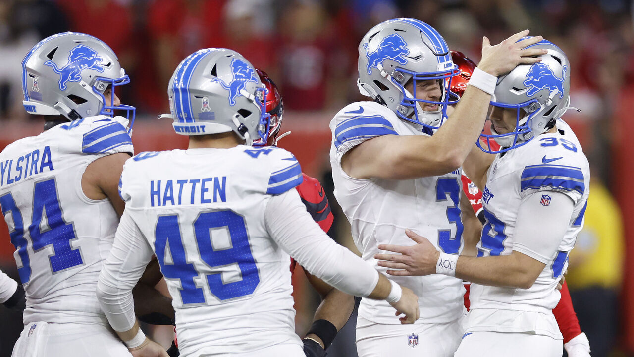 HOUSTON, TEXAS - NOVEMBER 10: Jake Bates #39 of the Detroit Lions celebrates a field goal with Jack Fox #3 after a field goal during the fourth quarter against the Houston Texans at NRG Stadium on November 10, 2024 in Houston, Texas.