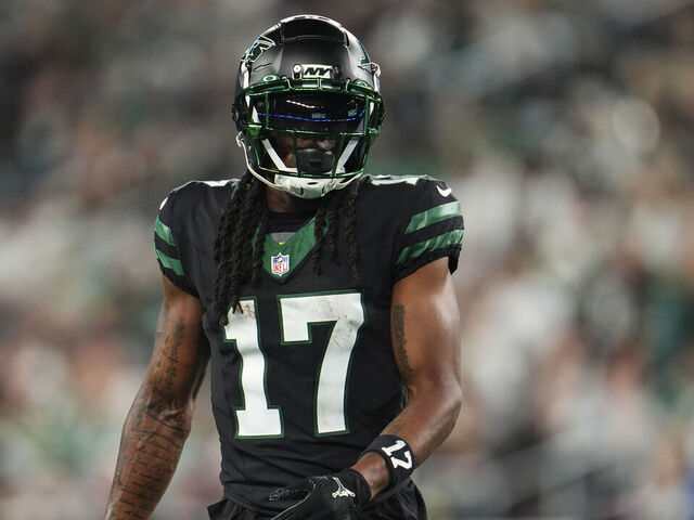 EAST RUTHERFORD, NJ - OCTOBER 31: Davante Adams #17 of the New York Jets looks on from the field during an NFL football game against the Houston Texans at MetLife Stadium on October 31, 2024 in East Rutherford, New Jersey.