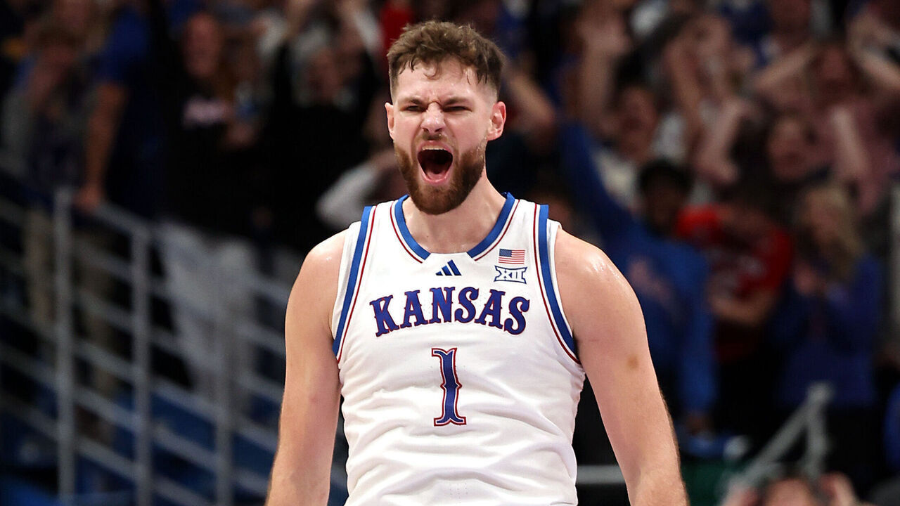 LAWRENCE, KANSAS - NOVEMBER 08: Hunter Dickinson #1 of the Kansas Jayhawks reacts after scoring during the first half of the game against the North Carolina Tar Heels at Allen Fieldhouse on November 08, 2024 in Lawrence, Kansas.