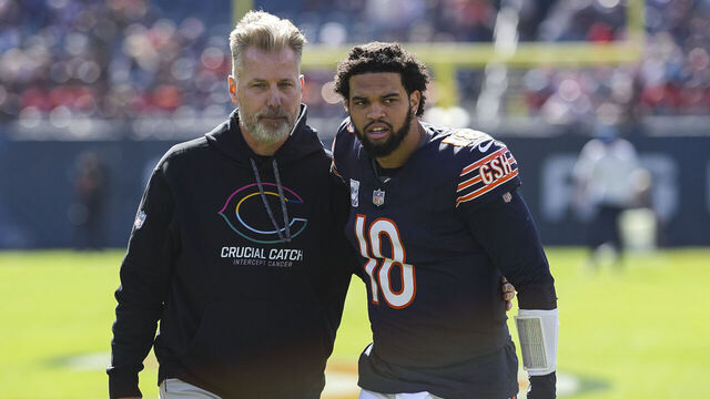 CHICAGO, ILLINOIS - OCTOBER 6: Head coach Matt Eberflus of the Chicago Bears stands on the field with quarterback Caleb Williams #18 prior to an NFL football game against the Carolina Panthers, at Soldier Field on October 6, 2024 in Chicago, Illinois.