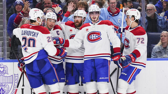 BUFFALO, NEW YORK - NOVEMBER 11: The Montreal Canadiens celebrate after a goal scored by Nick Suzuki #14 of the Montreal Canadiens during an NHL game on November 11, 2024 at KeyBank Center in Buffalo, New York.