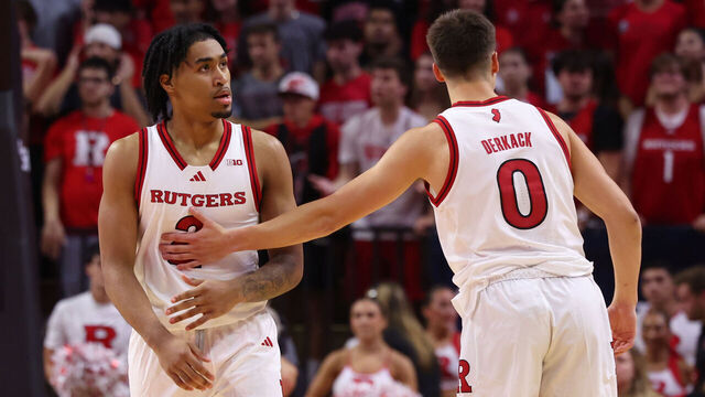 PISCATAWAY, NEW JERSEY - NOVEMBER 6: Dylan Harper #2 and Jordan Derkack #0 of the Rutgers Scarlet Knights during the first half celebrate a play against the Wagner Seahawks at Jersey Mike's Arena on November 6, 2024 in Piscataway, New Jersey.