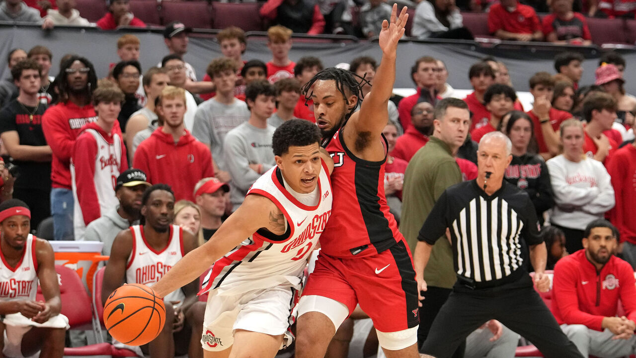 COLUMBUS, OH - NOVEMBER 11: Ohio State Buckeyes guard John Mobley Jr. (0) dribbles around Youngstown State Penguins guard Jason Nelson (0) during the second half of the game between the Ohio State Buckeyes and the Youngstown State Penguins at Value City Arena in Columbus, Ohio on November 11, 2024.